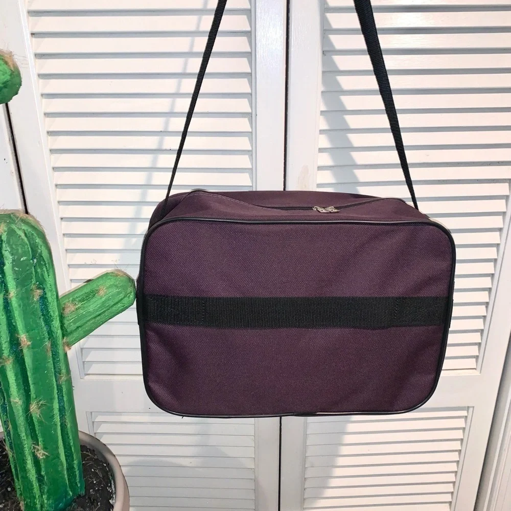 American Tourister Carry on travel bag Purple 16” X 11” X 6”